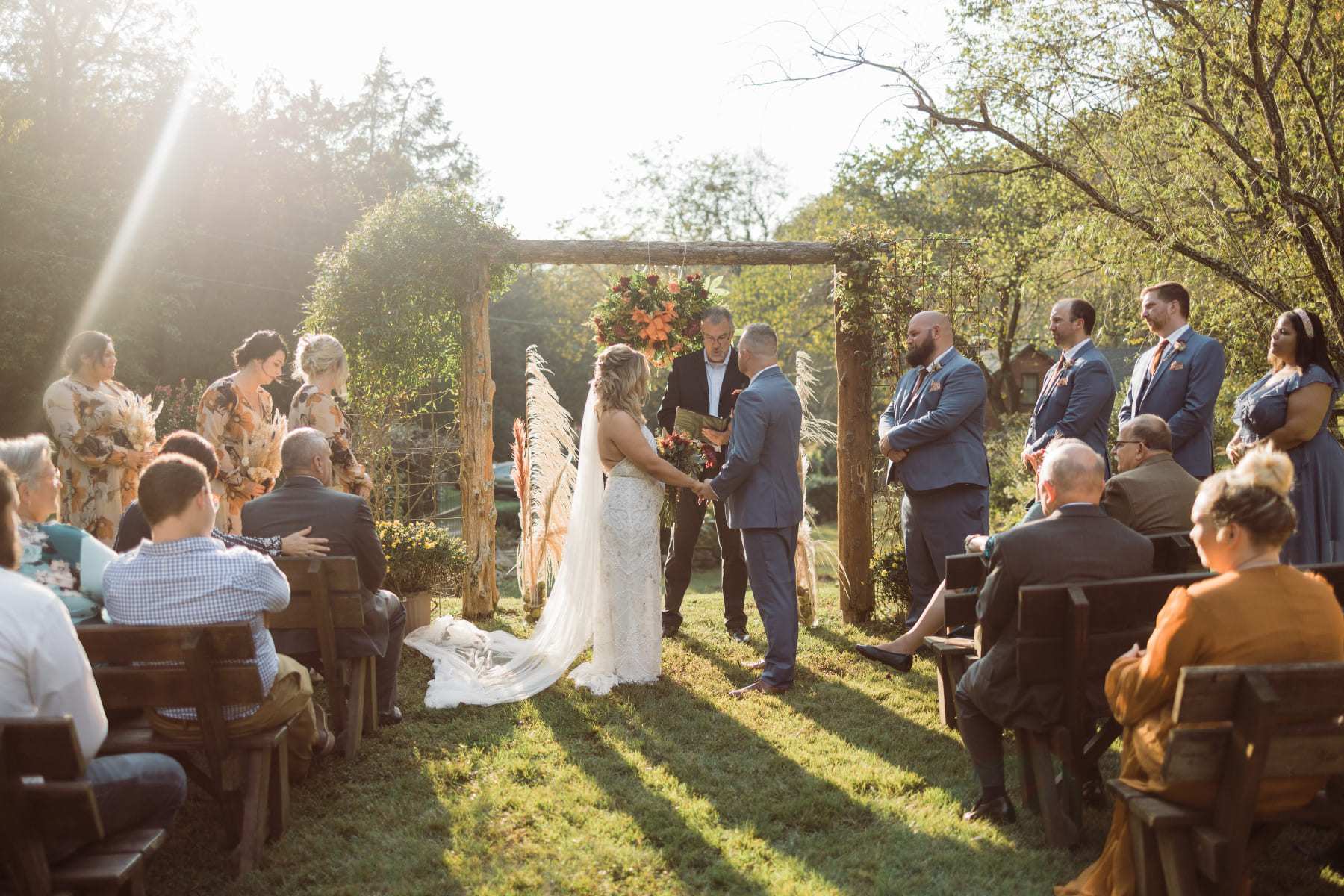 Outdoor ceremony at arch